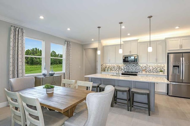 tiled dining area with ornamental molding