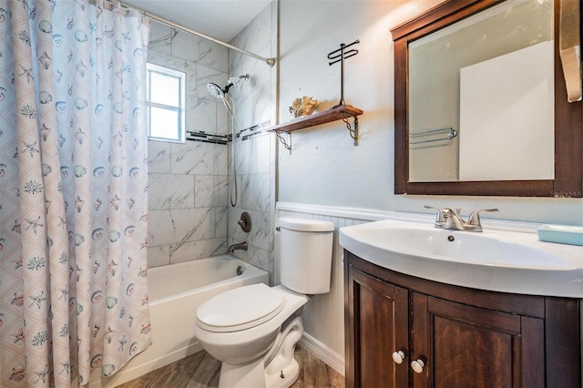 full bathroom with toilet, shower / bath combo, wood-type flooring, and vanity