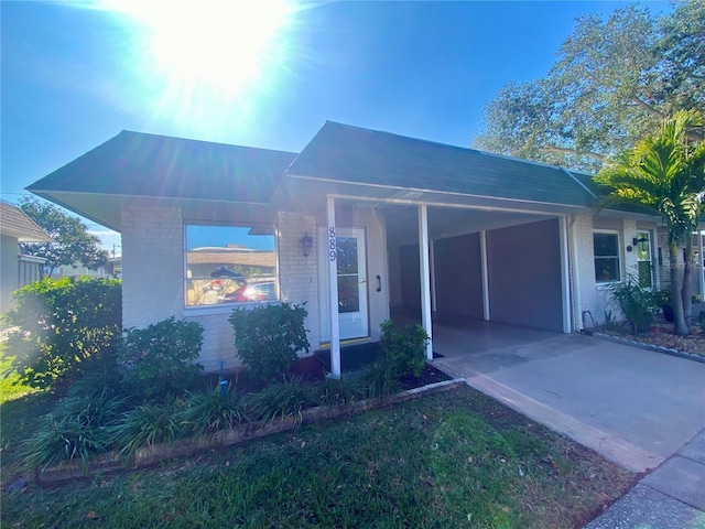 view of front of house with a carport