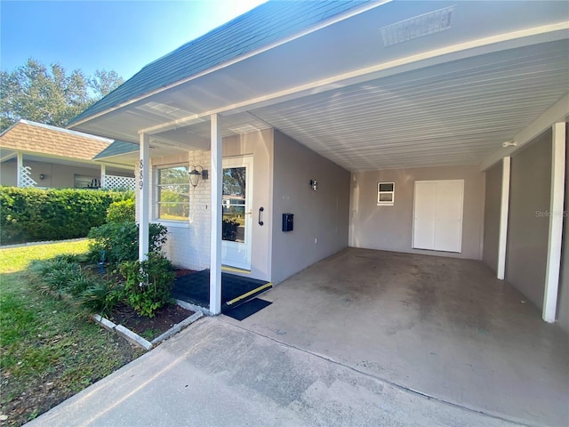 view of patio / terrace featuring a carport