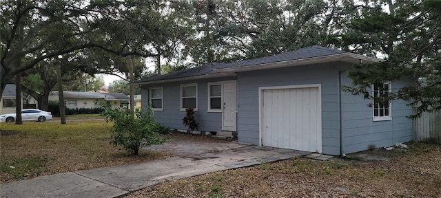 exterior space featuring a garage