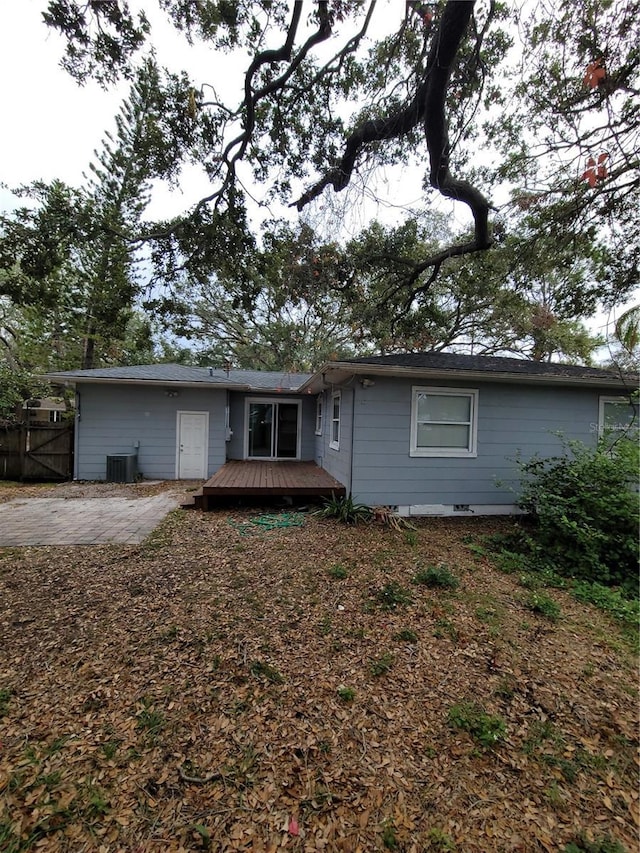 back of property featuring a patio area, central AC unit, and a wooden deck