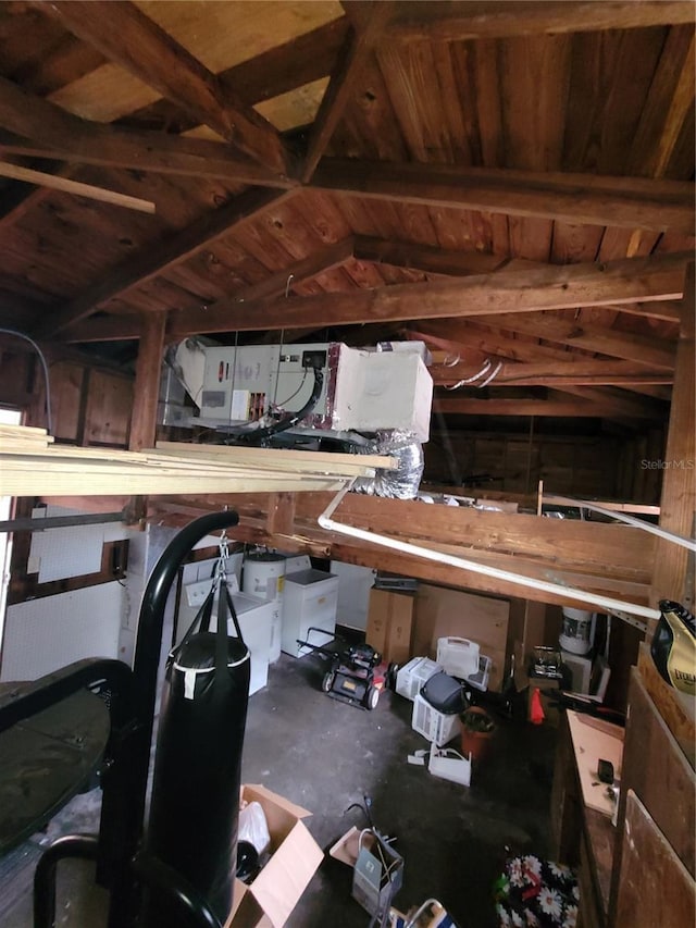 interior space featuring a workshop area and wooden ceiling