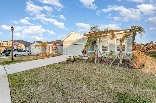 ranch-style home featuring a garage and a front yard