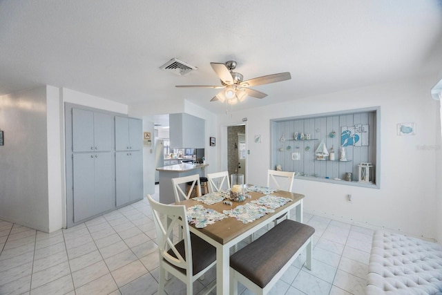 dining room with ceiling fan