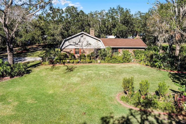 exterior space with a front lawn