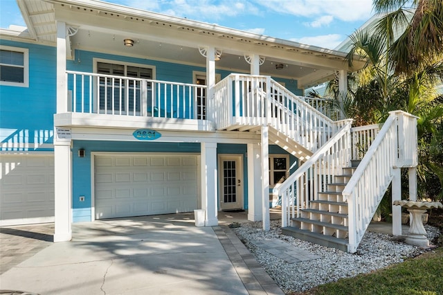 view of front of house with a garage and covered porch