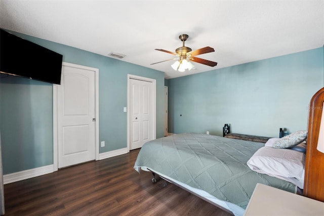 bedroom featuring ceiling fan and dark wood-type flooring