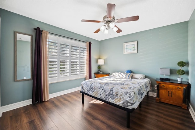 bedroom featuring dark wood-type flooring and ceiling fan