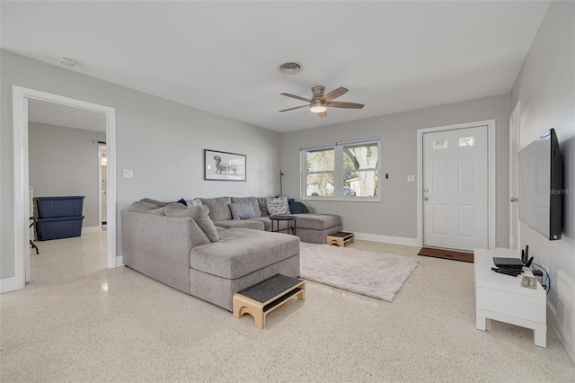 living room featuring ceiling fan