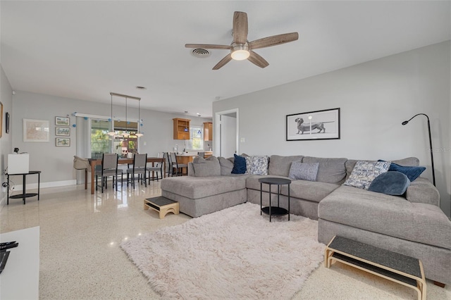 living room featuring ceiling fan