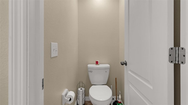 bathroom featuring toilet