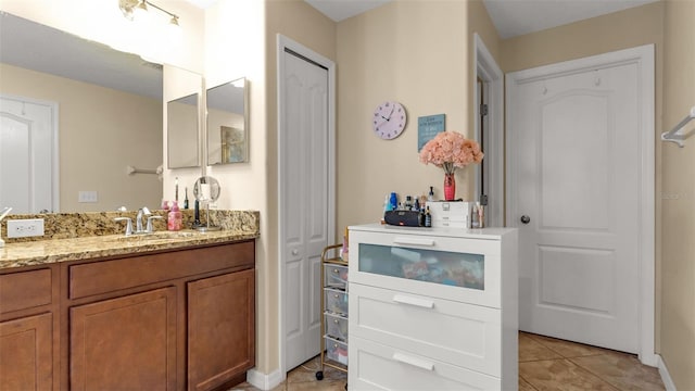 bathroom with vanity and tile patterned floors