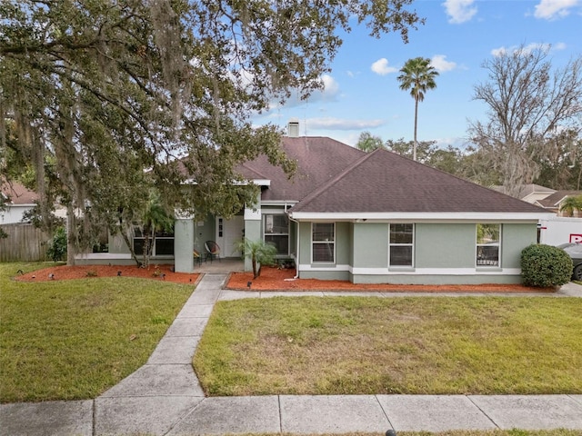 ranch-style house with a front yard