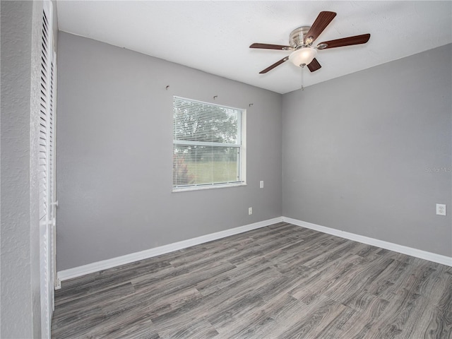 unfurnished bedroom featuring ceiling fan and hardwood / wood-style flooring