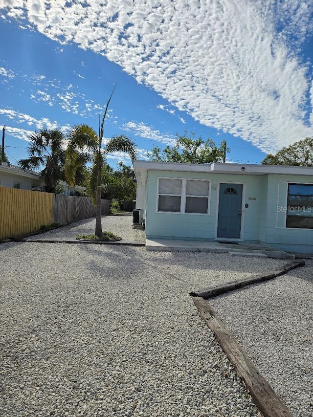 view of front of home featuring central air condition unit