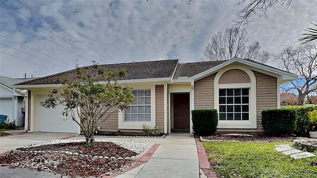 single story home with a garage