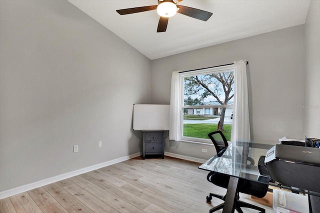 office with ceiling fan, light hardwood / wood-style flooring, and lofted ceiling