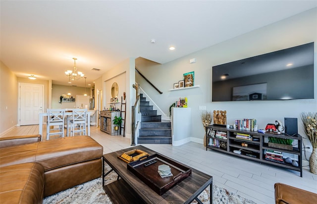 living room featuring an inviting chandelier