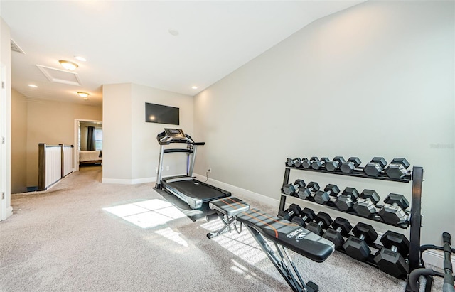 workout room with lofted ceiling