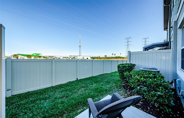 view of yard with central AC unit