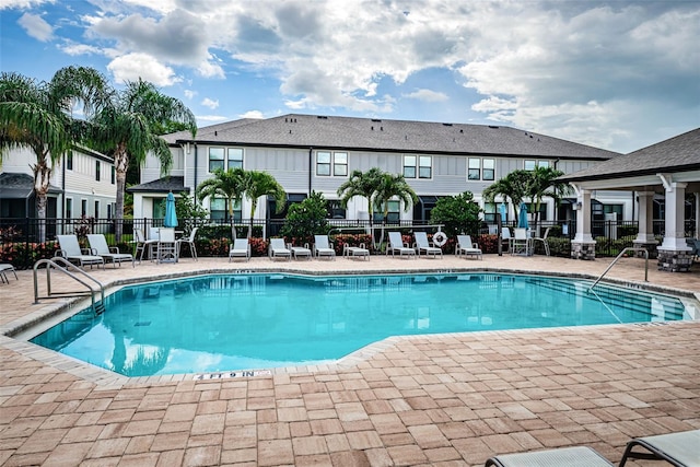 view of pool featuring a patio area