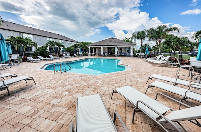 view of swimming pool featuring a patio