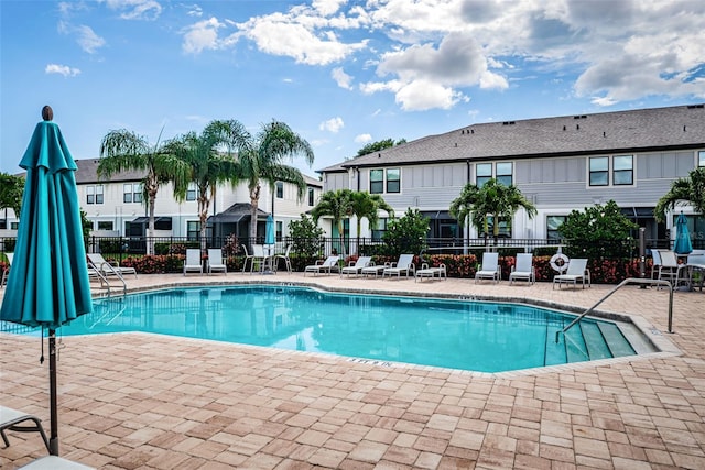 view of swimming pool featuring a patio