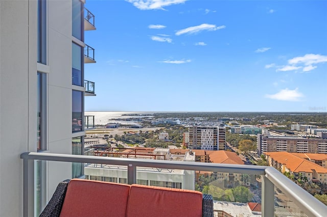 balcony featuring a water view