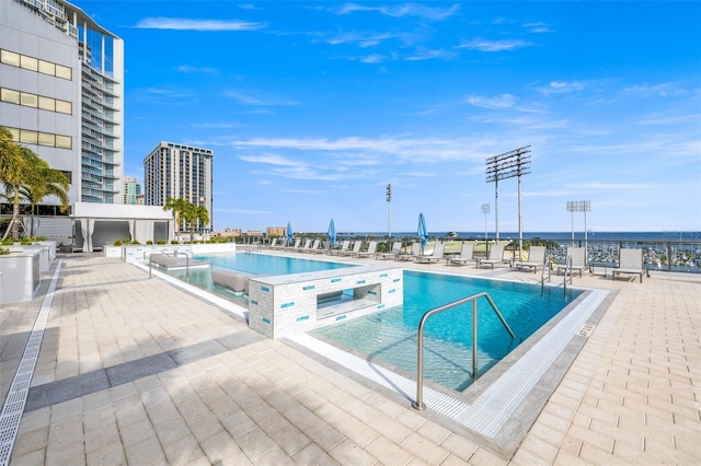 view of pool featuring a patio