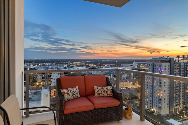 view of balcony at dusk