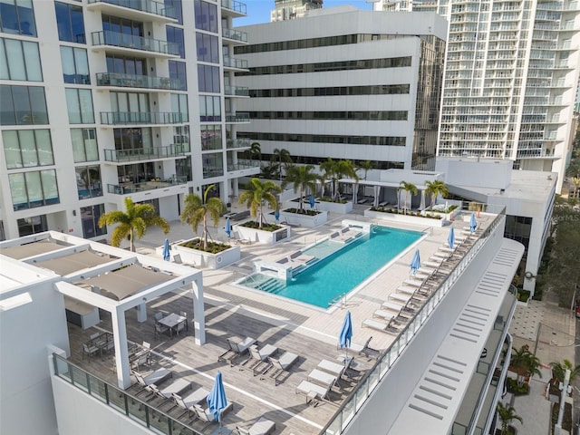 view of swimming pool featuring a patio area