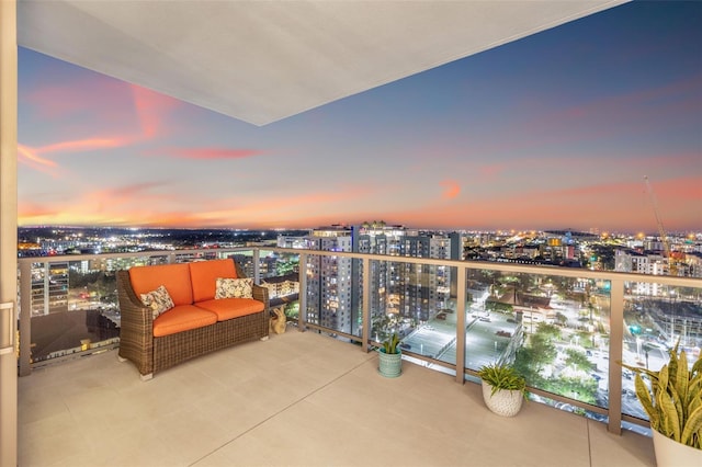 301 1st St S Unit 2006, Saint Petersburg, FL 33701 - balcony at dusk with a view of city and outdoor lounge area