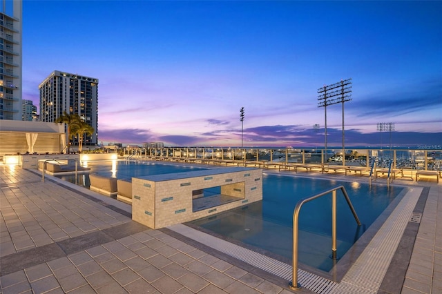 301 1st St S Unit 2006, Saint Petersburg, FL 33701 - pool at dusk featuring a view of city