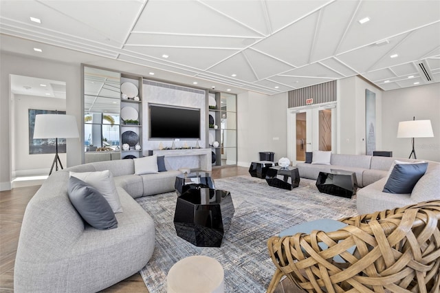 301 1st St S Unit 2006, Saint Petersburg, FL 33701 - living room featuring wood finished floors, recessed lighting, coffered ceiling, and baseboards