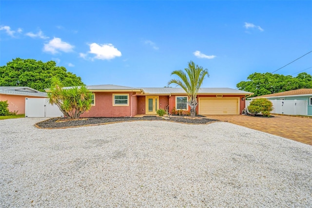 single story home with a garage