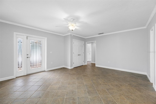 empty room with tile patterned flooring, ceiling fan, and ornamental molding