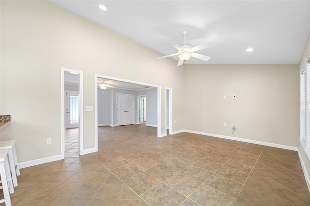 interior space with ceiling fan