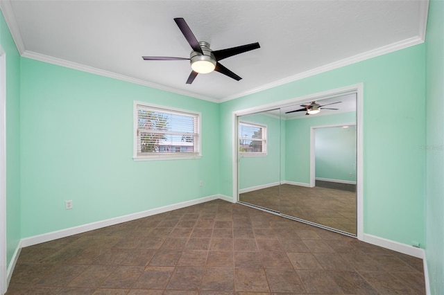 unfurnished bedroom with a closet, ceiling fan, and crown molding