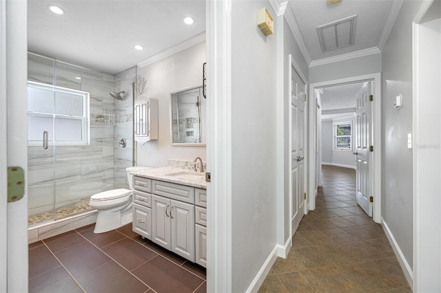 bathroom with ornamental molding, walk in shower, vanity, and toilet