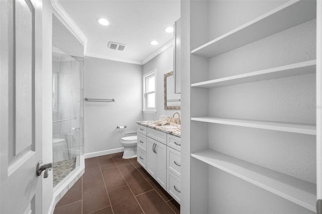 bathroom featuring ornamental molding, a shower, vanity, and toilet