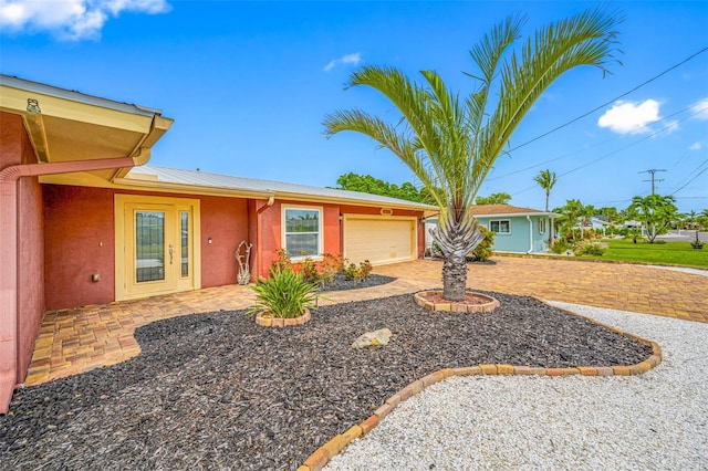 single story home with a garage