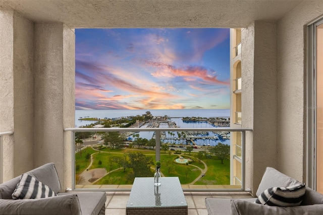 balcony at dusk with a water view