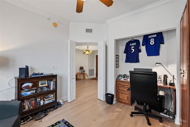 office space with ceiling fan with notable chandelier, light hardwood / wood-style floors, and crown molding