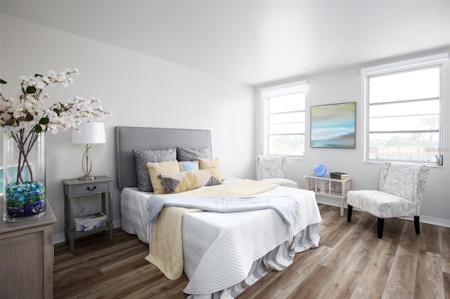 bedroom with wood-type flooring