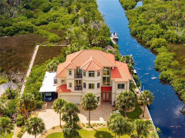 birds eye view of property featuring a water view