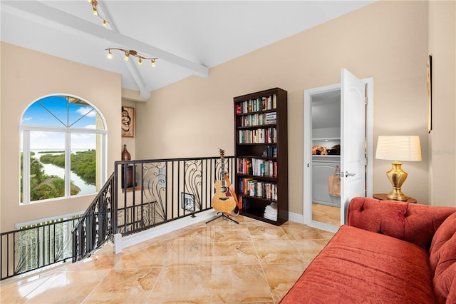 sitting room featuring baseboards, marble finish floor, and an upstairs landing