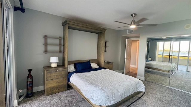 bedroom featuring ceiling fan and carpet floors