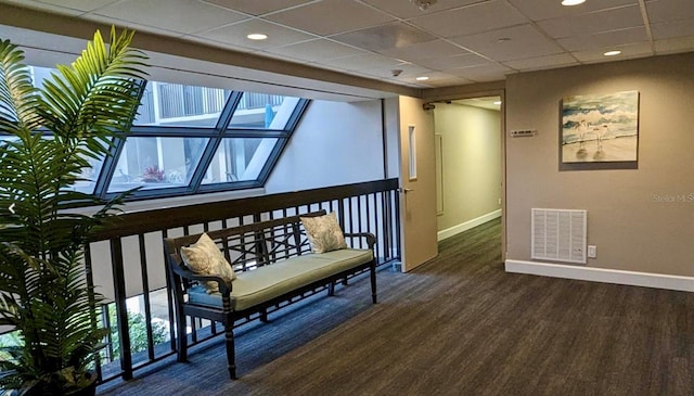 interior space featuring a paneled ceiling