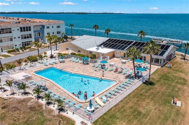 birds eye view of property featuring a water view